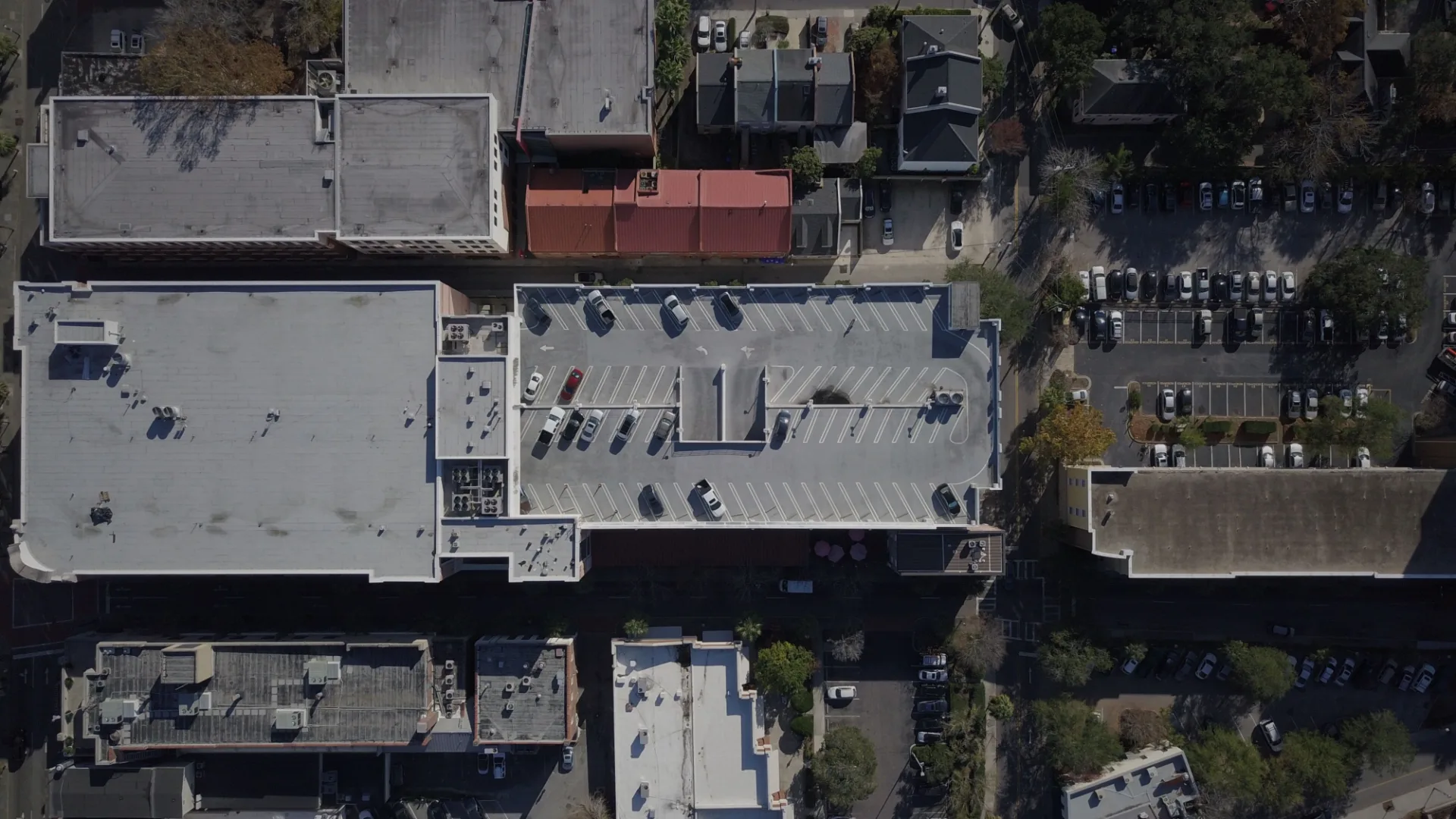 Aerial view of flat roof systems across an Irving apartment property