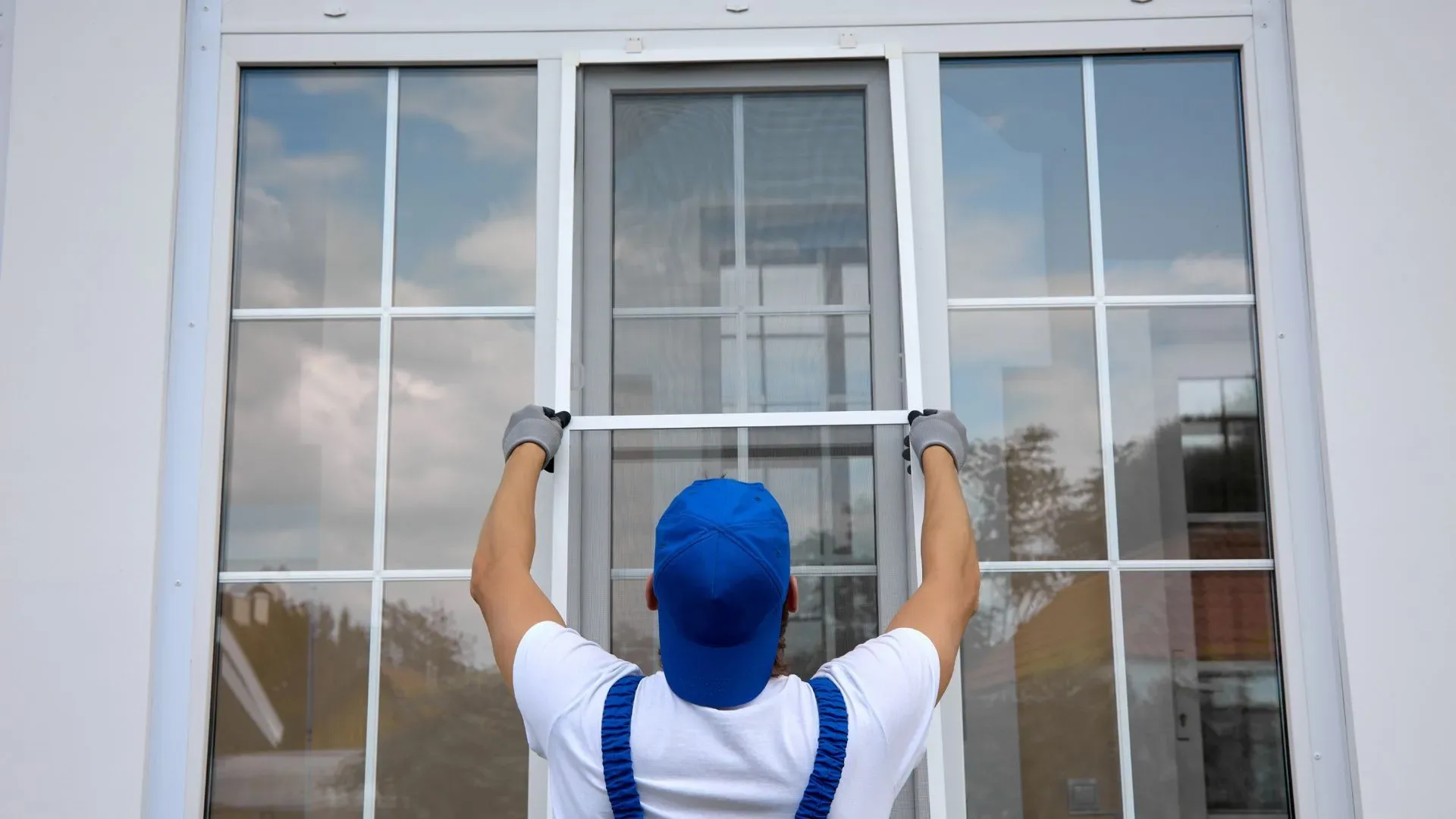 Technician installing a new commercial window unit
